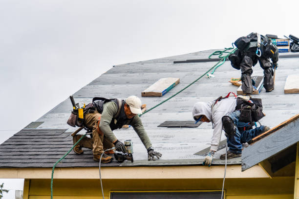 Professional Gutter Installation technician working in Winsted, CT